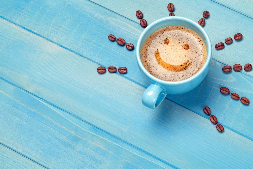 Xícara de café com sorriso