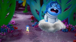 Reprodução Disney Pixar Cena do filme 'Divertida Mente' em que a Tristeza está chorando conversando com a Alegria