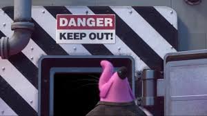 Reprodução Disney Pixar Personagem Bing-Bong lendo placa de perigo