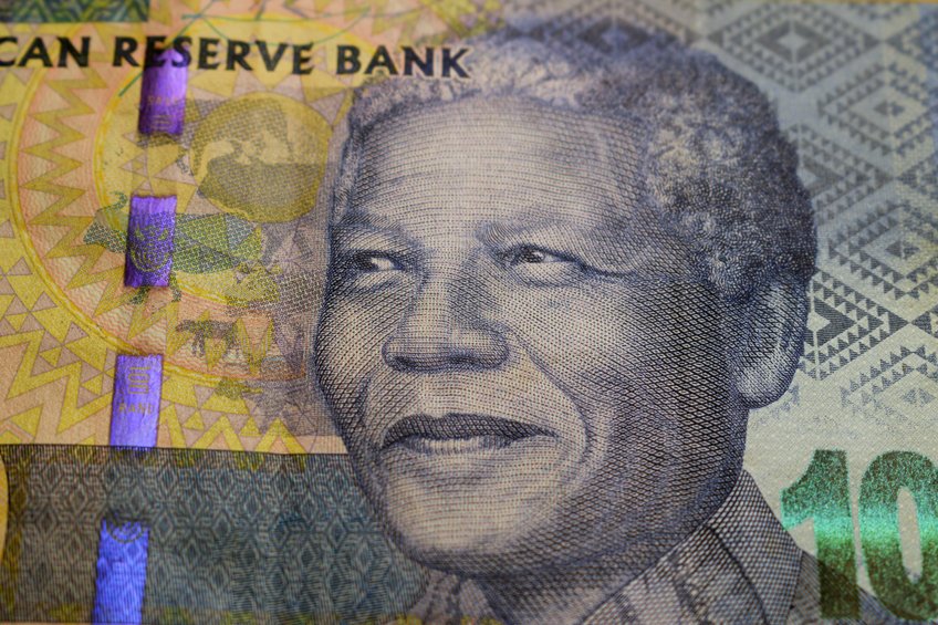Nota de dólar com Nelson Mandela ilustrado.