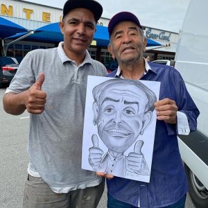 Instagram: @ivoholandasbt Ivo Holanda com desenhista e caricatura