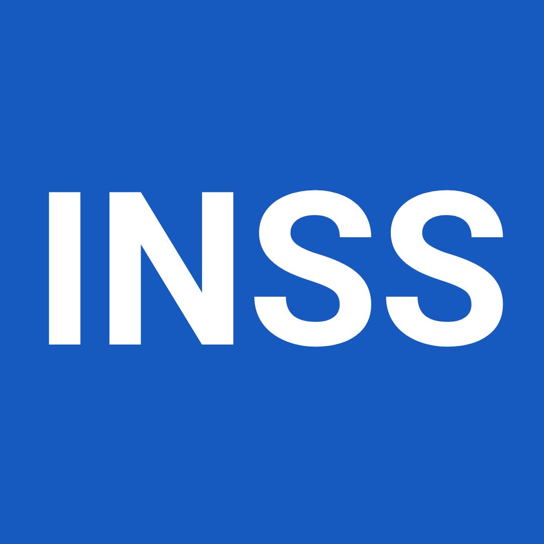 Palavra INSS escrita em branco em frente à fundo azul