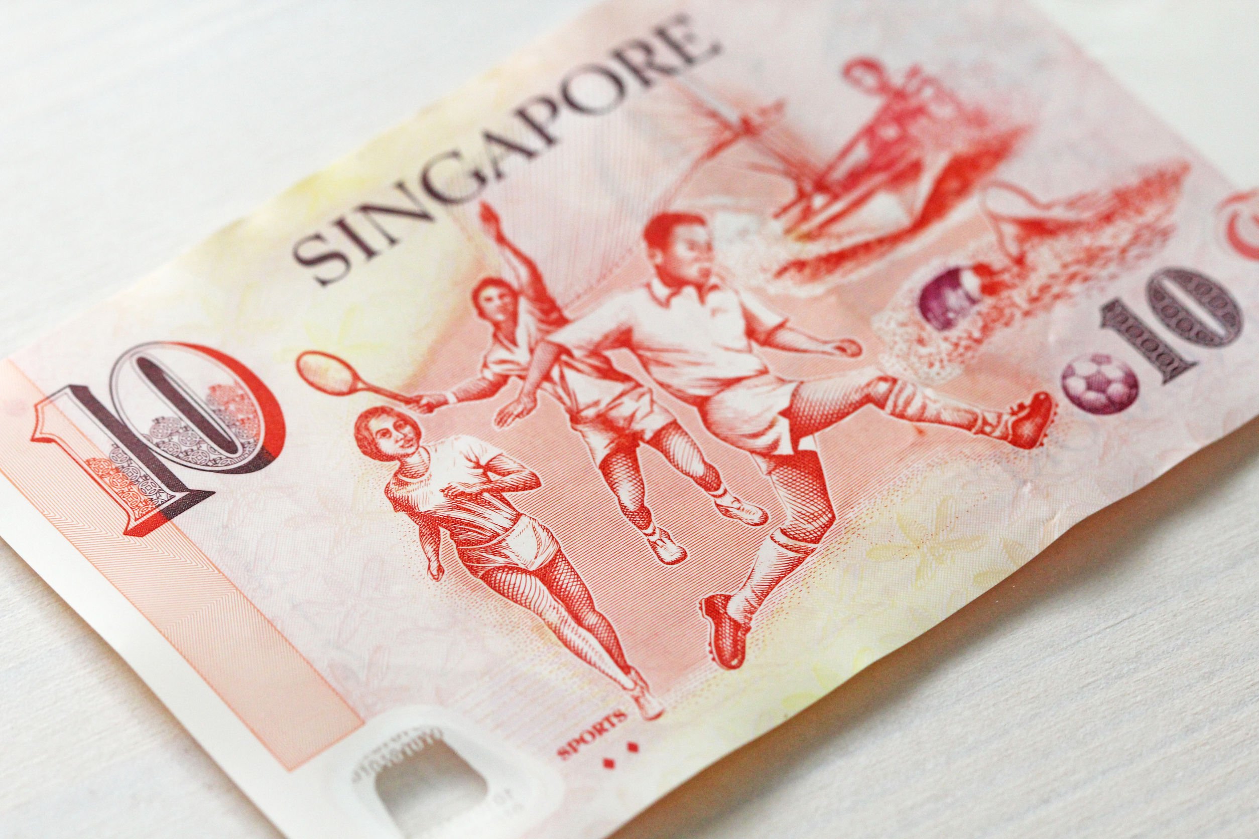 Dez dólares de Cingapura com uma nota