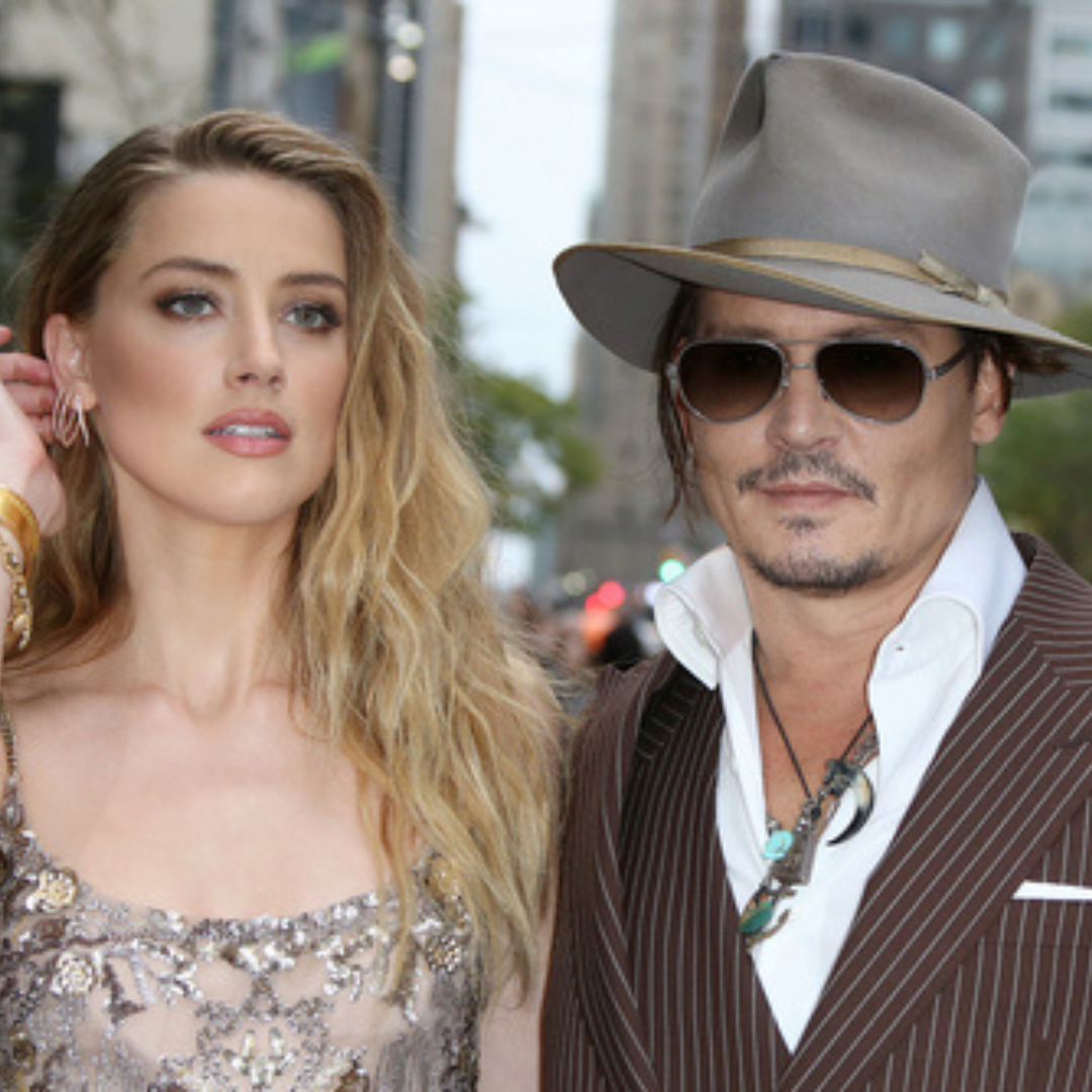 Imagem do ator Johnny Depp e da atriz Amber Heard