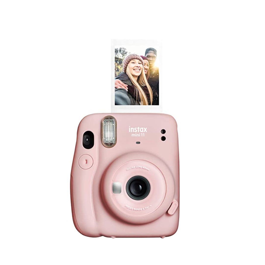 Câmera fotográfica Instax na cor rosa.