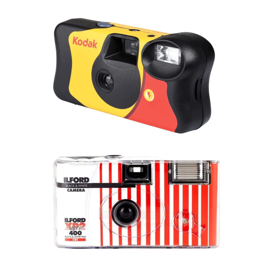 'Duas Câmeras fotográficas analógicas. Uma preta, amarela e vermelha e outra branca  e vermelha.'