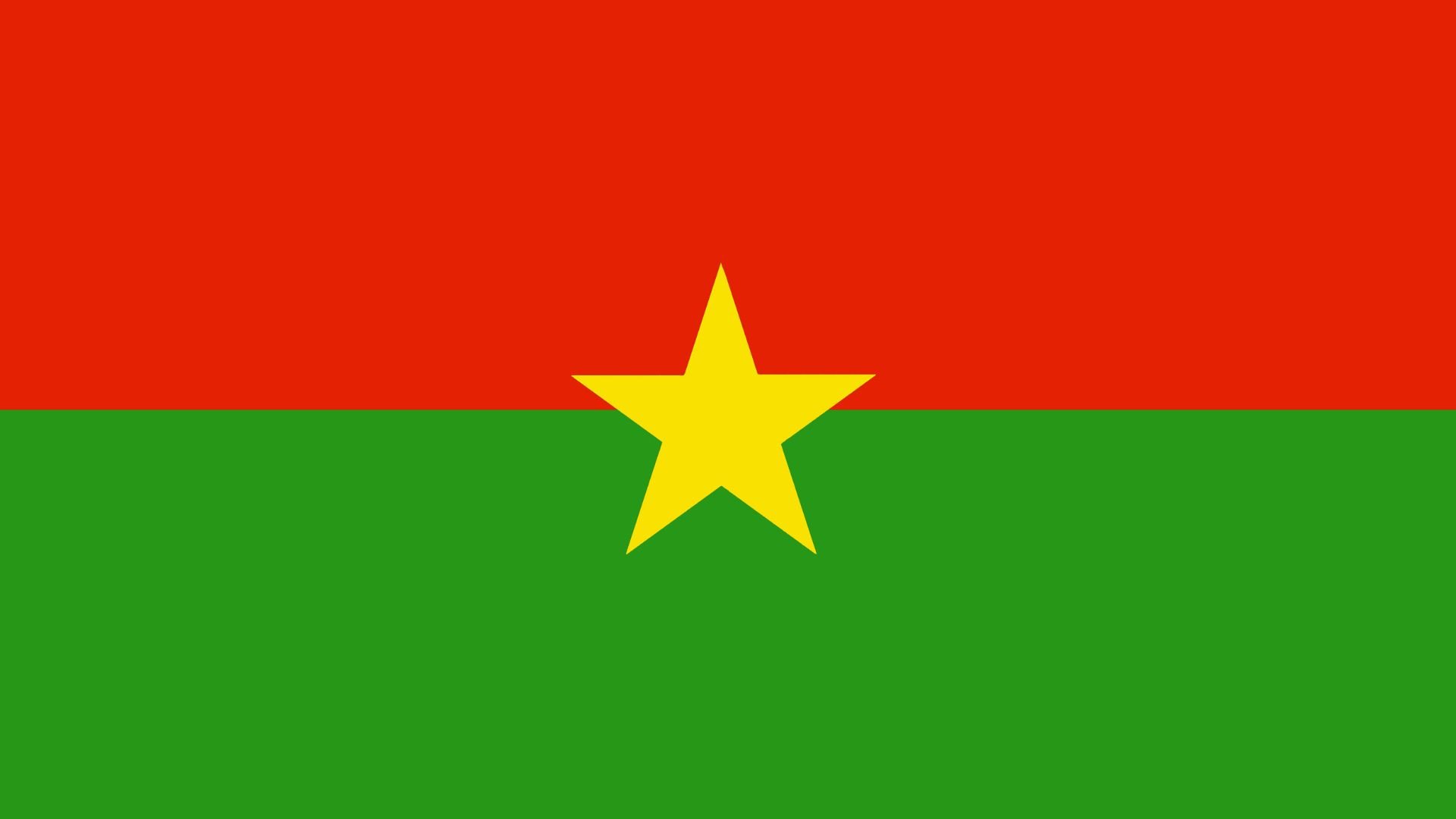 A bandeira é formada por duas listras horizontais, de igual largura, sendo a parte superior vermelha e a inferior verde, com uma estrela amarela de cinco pontas no centro da bandeira.
