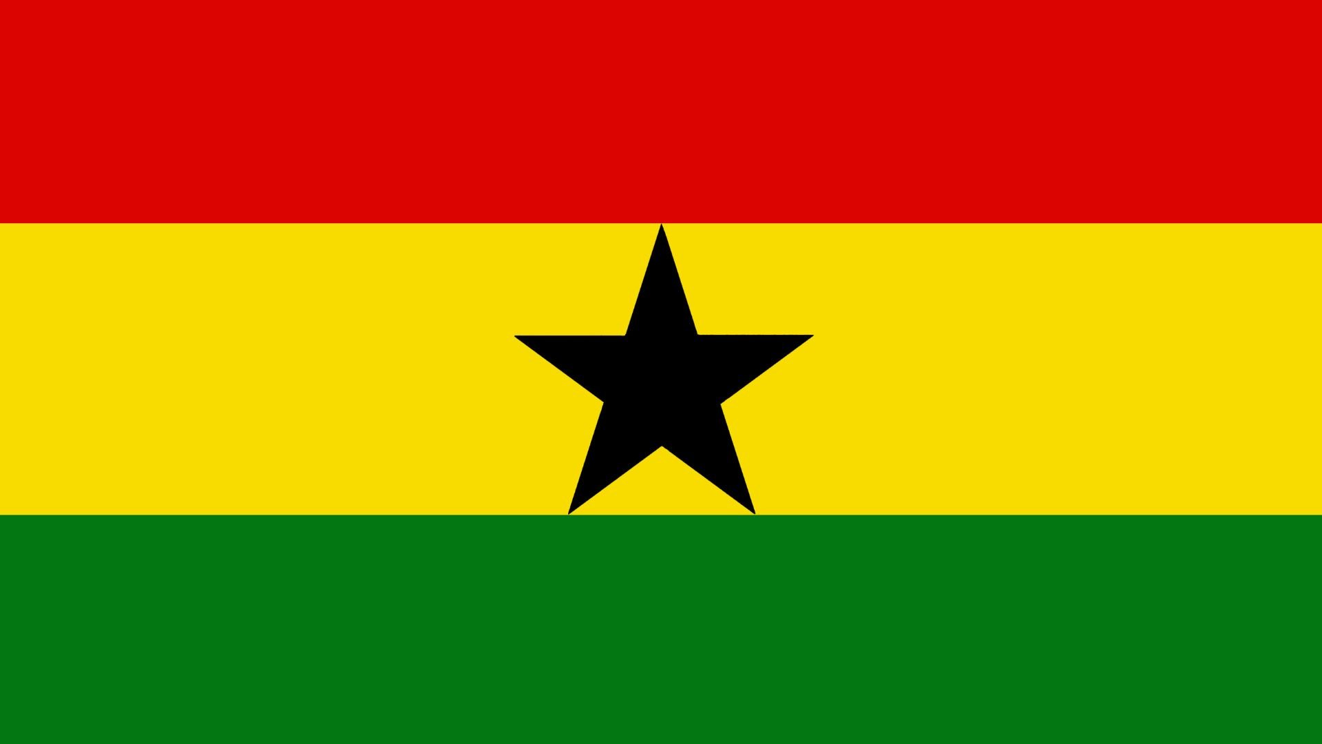 A bandeira é constituída por três listras horizontais vermelha, amarela e verde, e no centro da bandeira uma estrela negra.