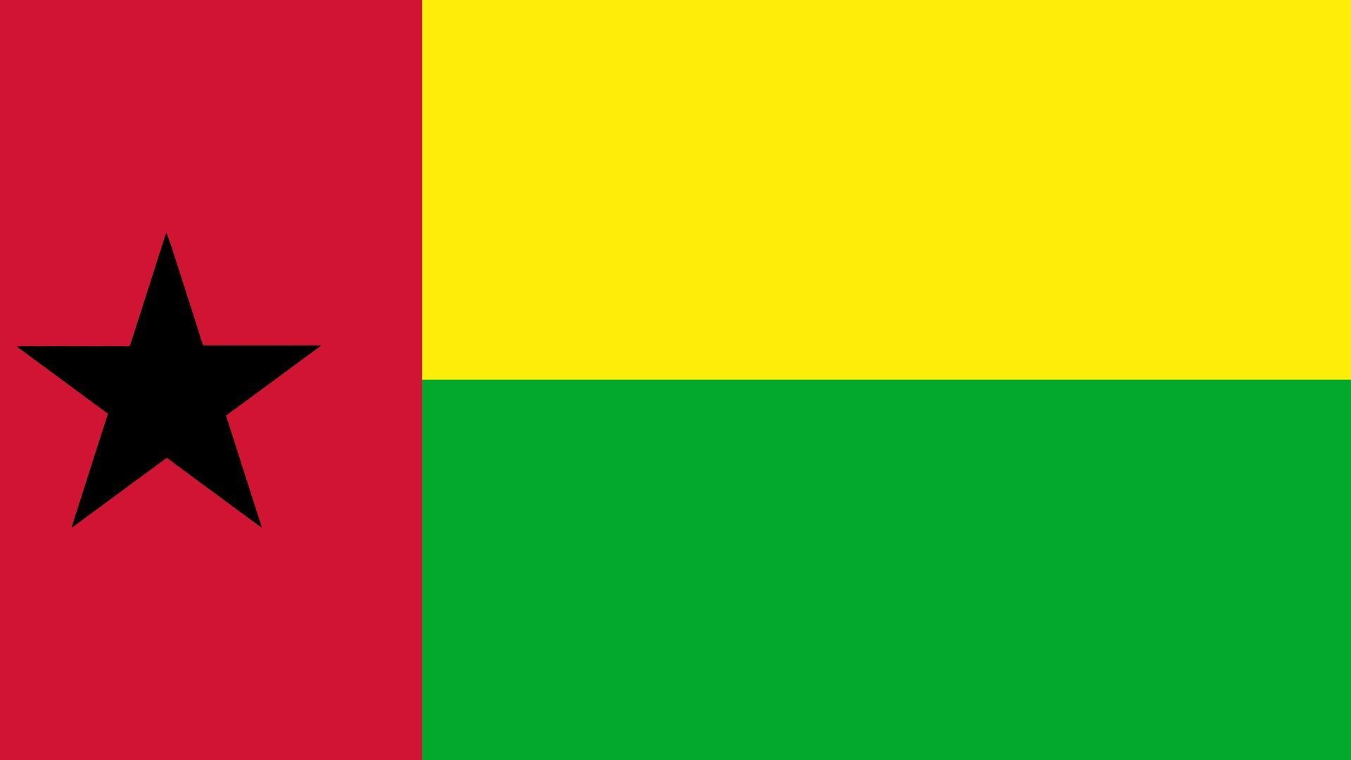 A bandeira traz uma estrela na cor preta, posicionada do lado esquerdo da tela. A estrela é um símbolo de unidade africano. As cores são vermelho, amarelo e verde. A cor amarela representa o sol, a cor verde remete à esperança e a cor vermelha representa o sangue derramado durante a longa luta pela independência de Portugal.