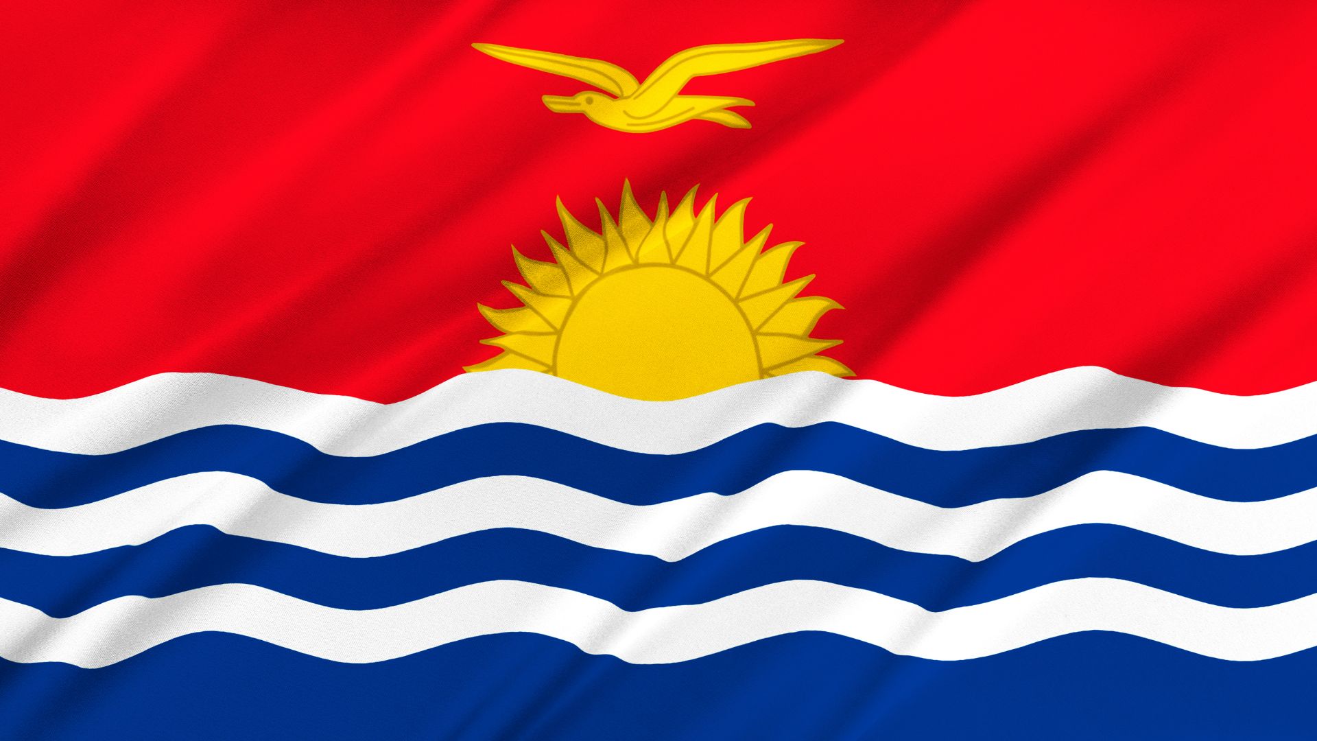 A bandeira de Kiribati é composta por quatro cores: vermelha, azul, branco e amarelo. A metade superior da bandeira é da cor vermelha com uma fragata dourada voando sobre um sol nascente e a metade de baixo é azul com três linhas brancas horizontais que representam o oceano.