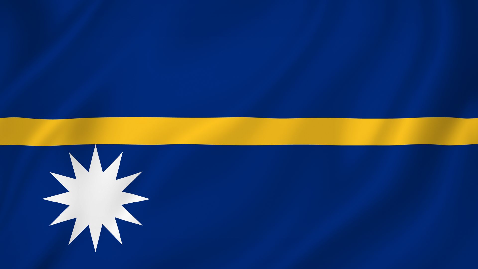 A bandeira de Nauru é composta por três cores: azul, amarelo e branco. A estreita faixa amarela, representa a linha do Equador. A estrela de doze pontas, localizada na parte inferior do canto esquerdo, simboliza a localização da ilha nas águas azuis do Pacífico em relação à linha do Equador.