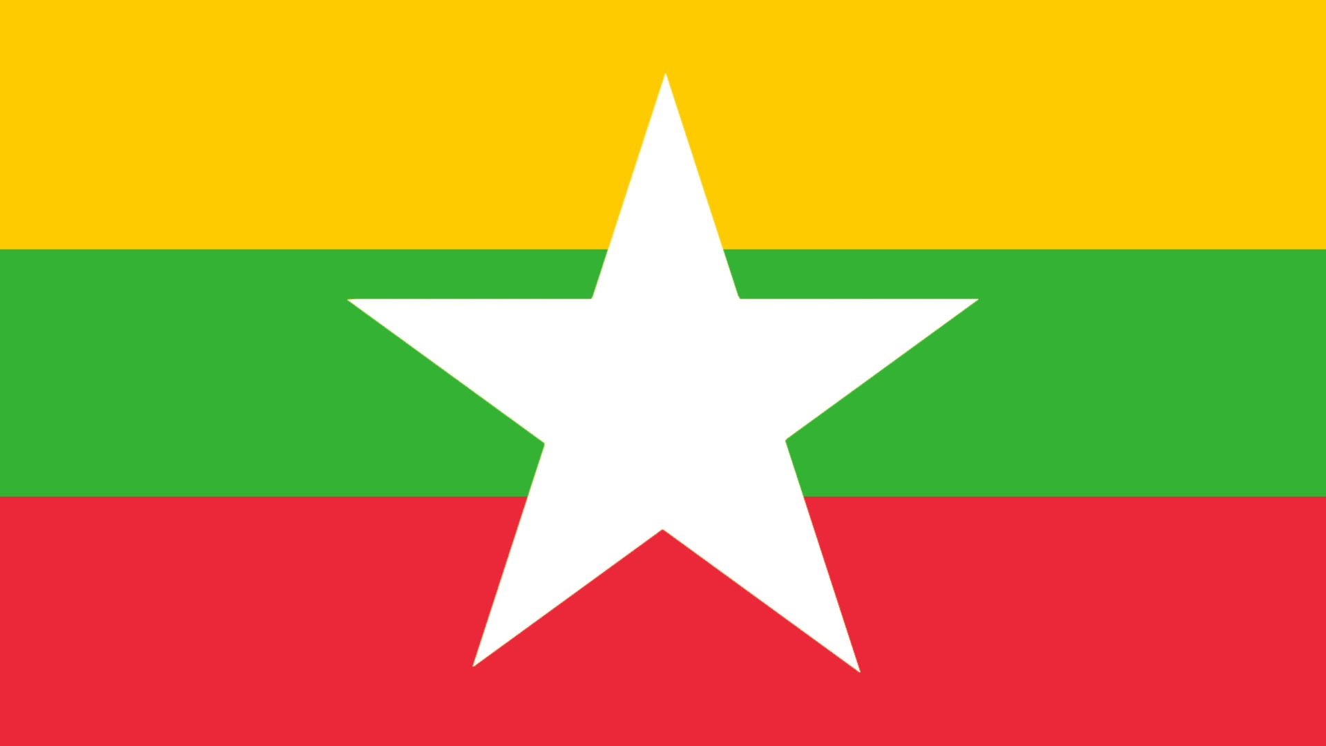 A bandeira de Mianmar possui três faixas horizontais nas cores amarelo, verde e vermelho, nesta ordem, de cima para baixo e uma estrela branca atravessada no centro da bandeira até a metade das faixas das pontas.