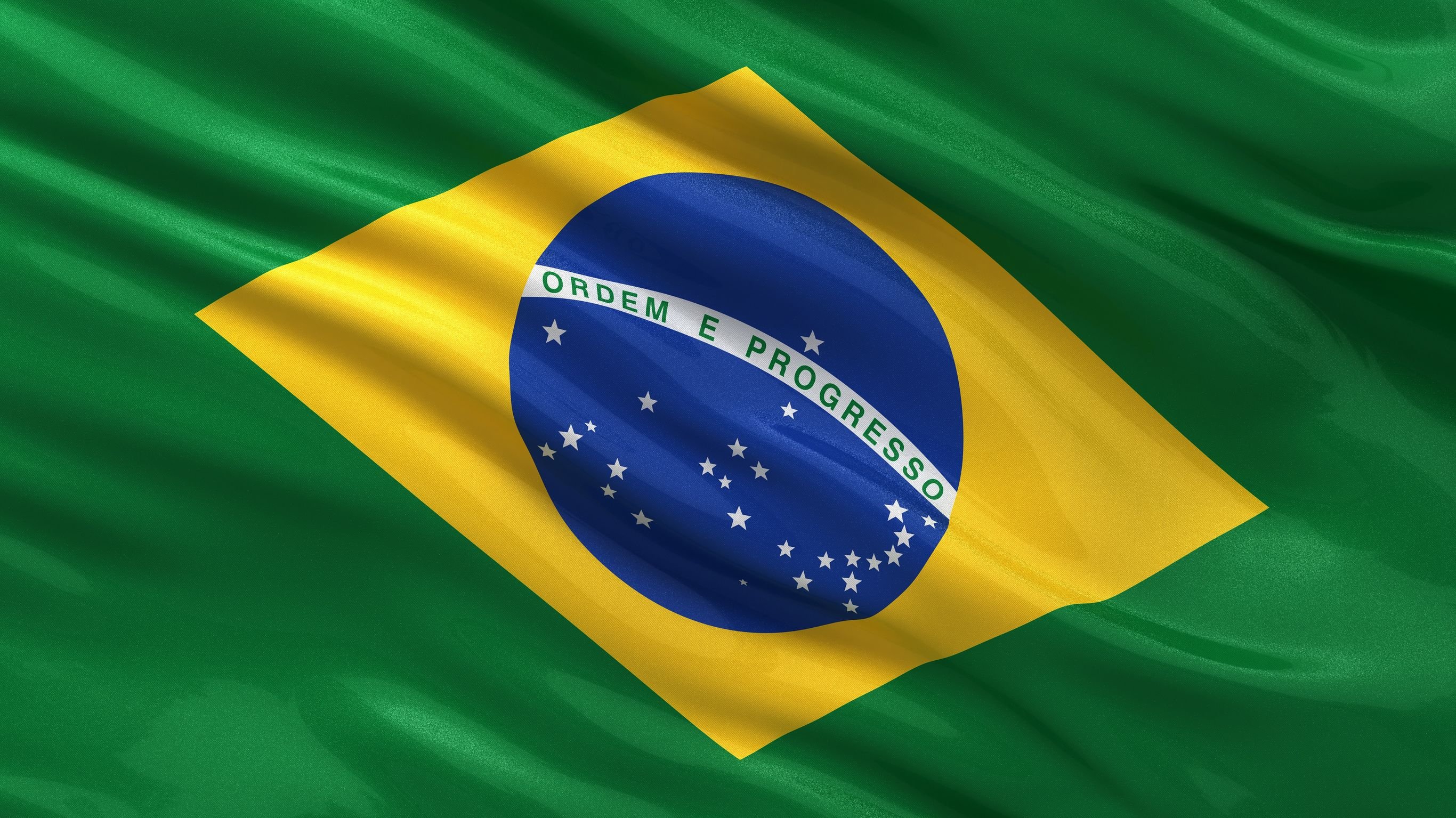 Bandeira do Brasil balançando ao vento.