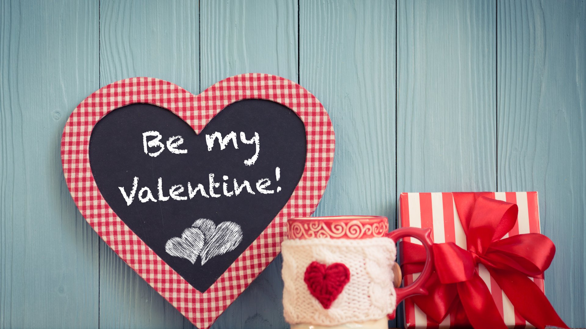 Cartão em formato de coração com a frase 'Be my valentine'