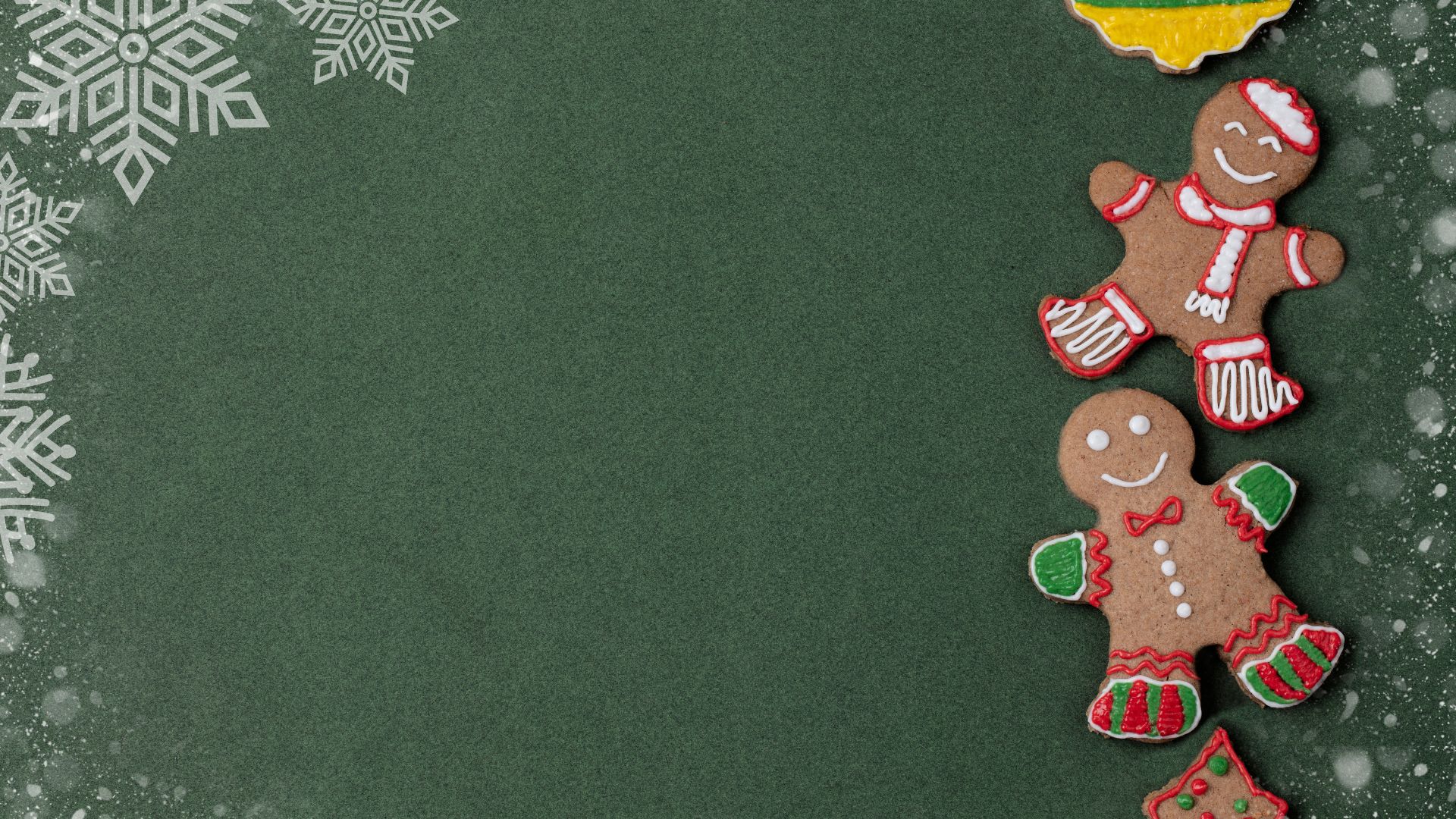 Imagem de fundo verde. Do lado direito da tela, bonecos natalinos comestíveis.