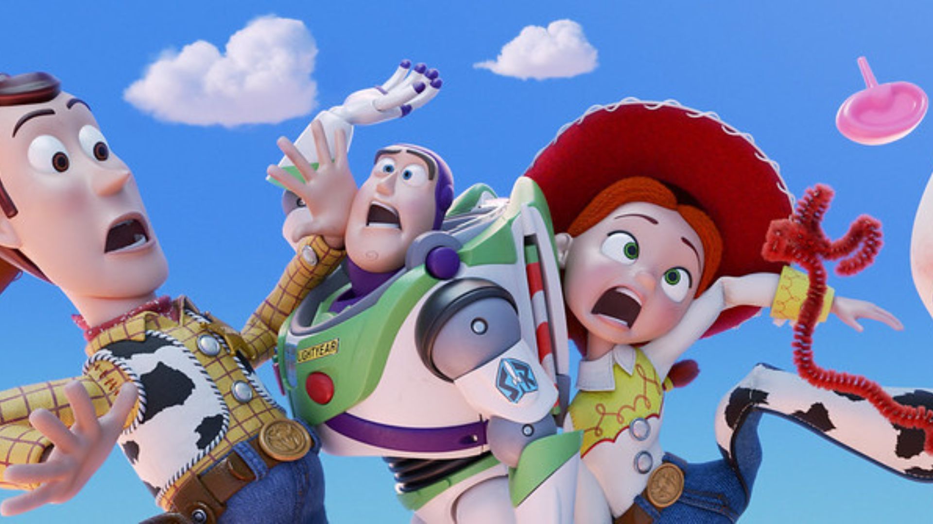 Imagem de Woody, Buzz Lightyear e Jessie caindo do céu com feição apavorada.