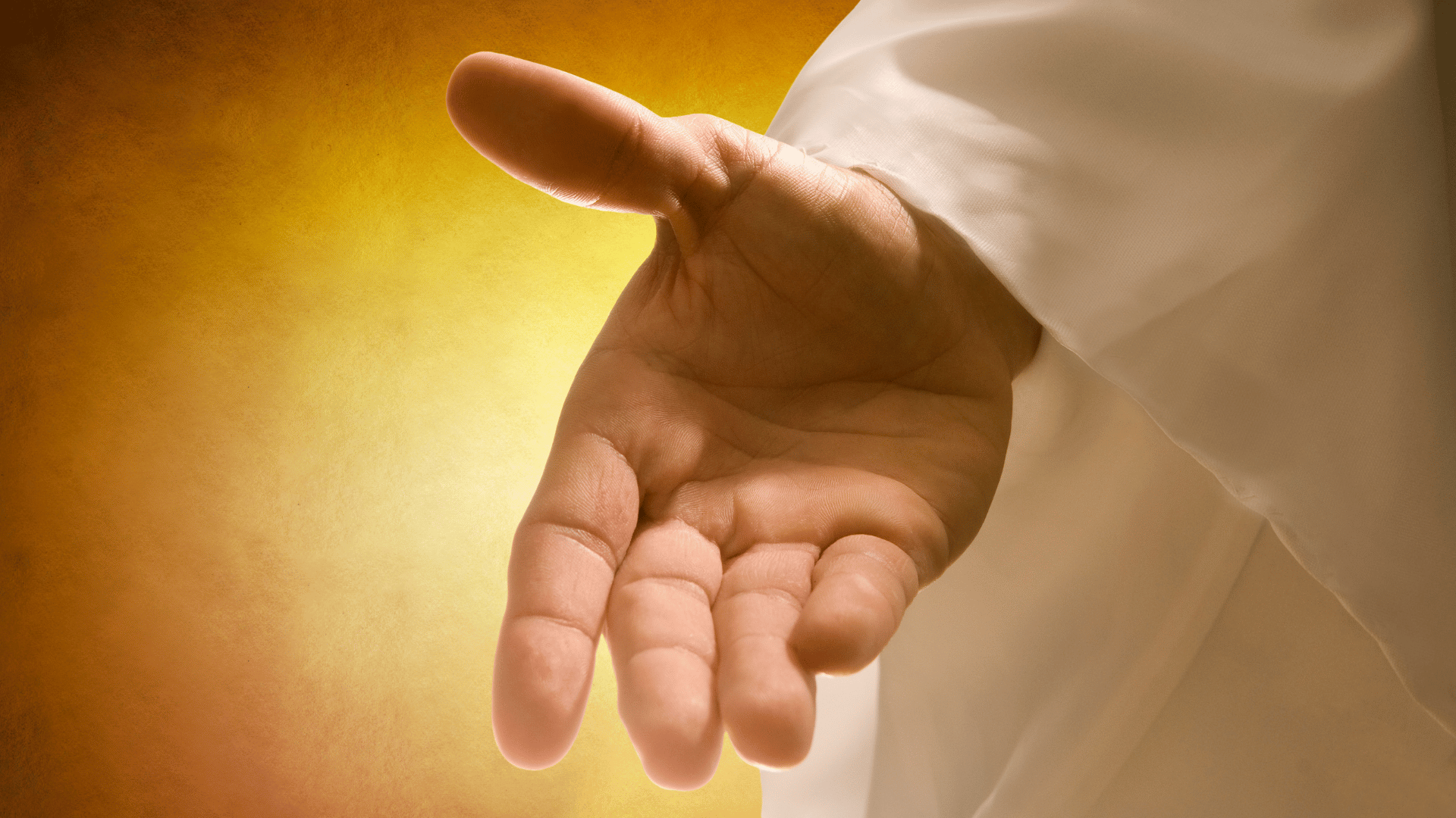 Mão de uma pessoa, representando a mão de Deus. Ao fundo, a imagem de uma luz amarela.