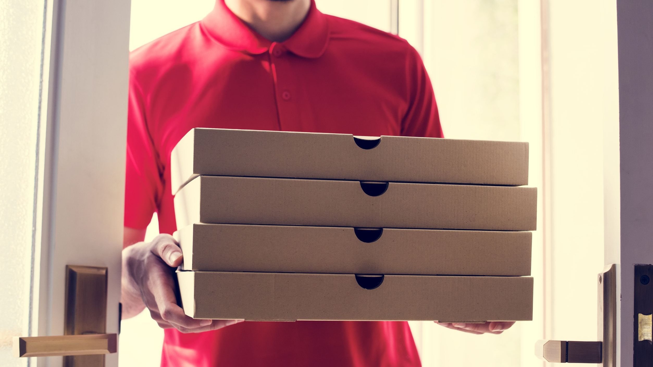rawpixel/123RF Entregador de pizza.