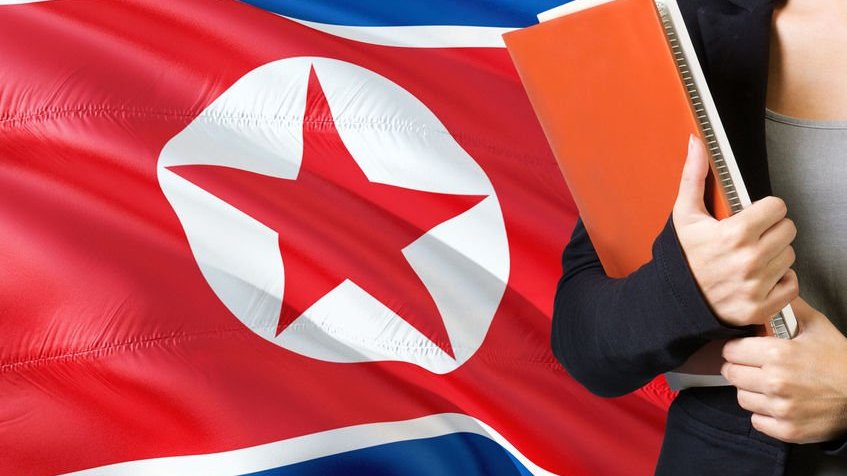 Bandeira da Coreia do Sul e pessoa segurando livros