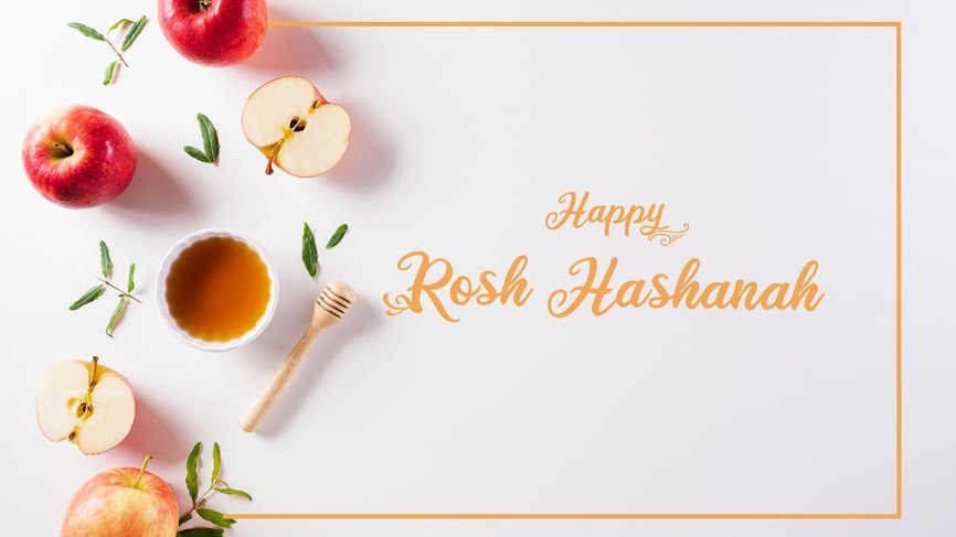 Maçã, mel e os dizeres Happy Rosh Hashanah